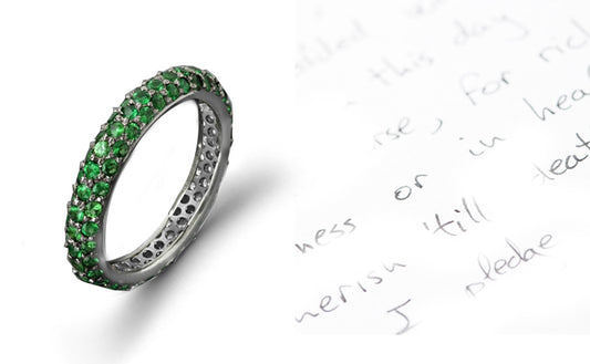 stackable eternity ring with alternating pave set emeralds and diamonds