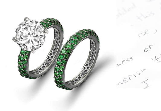 bridal set with round diamond center and pave set emerald band