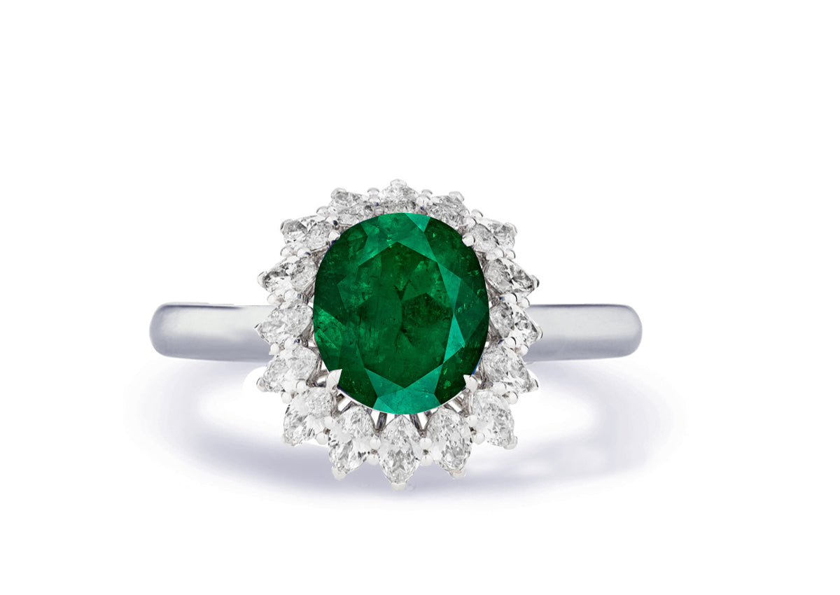 Custom made antique vintage inspired emerald and diamond halo engagement rings 1