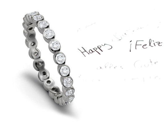 eternity ring bezel set with round cut diamonds