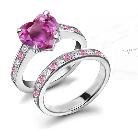 bridal set handcrafted with heart pink sapphire center and band with alternating round pink sapphires and diamonds