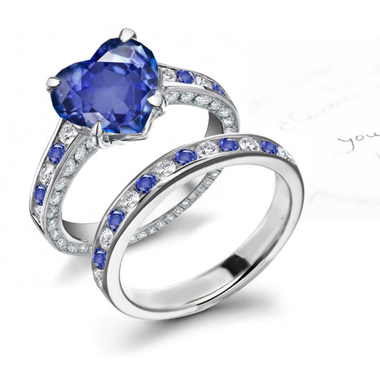 bridal set handcrafted with heart blue sapphire center and band with alternating round blue sapphires and diamonds