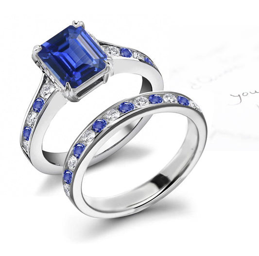 bridal set handcrafted with emerald cut blue sapphire center and band with alternating round blue sapphires and diamonds