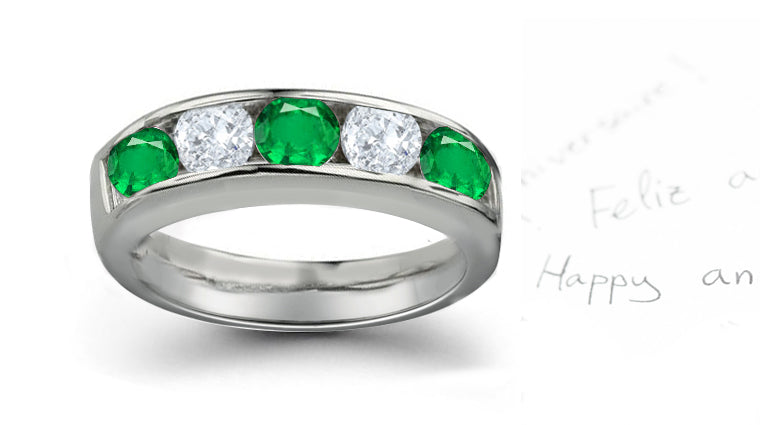 Anniversary ring with 7 alternating round emeralds and diamonds