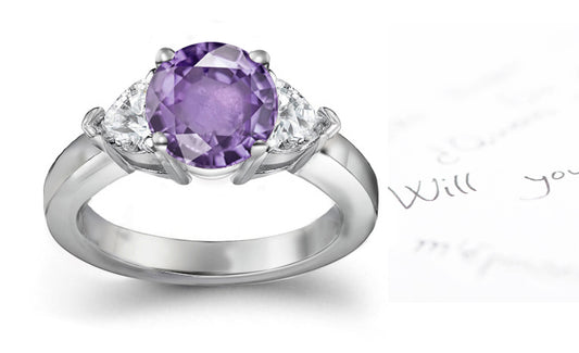 engagement ring three stone with round purple sapphire center and side heart diamonds