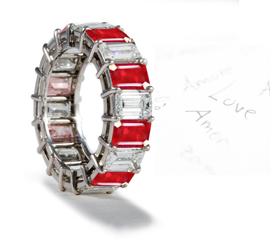 eternity ring prong set with emerald cut rubies and diamonds