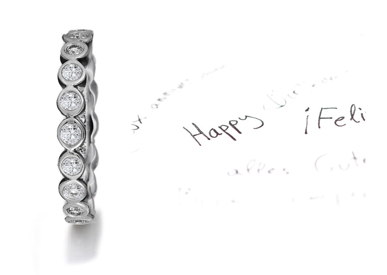 stackable eternity band with bezel set round diamonds