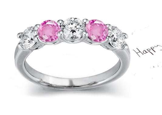 anniversary ring handcrafted with alternating round pink sapphires and diamonds