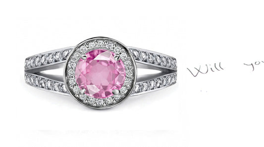engagement ring handcrafted with round pink sapphire center and diamond halo/band