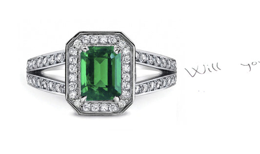engagement ring handcrafted with emerald cut emerald center and diamond halo/band