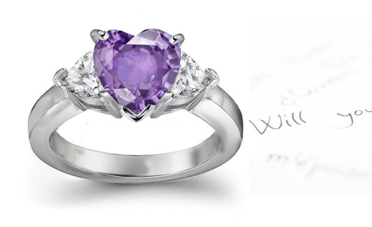 engagement ring three stone with heart purple sapphire center and side heart diamonds