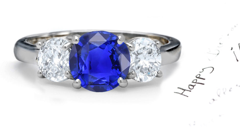 engagement ring three stone with round blue sapphire and side round diamonds