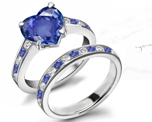 bridal set handcrafted with heart blue sapphire center and band with alternating round blue sapphires and diamonds