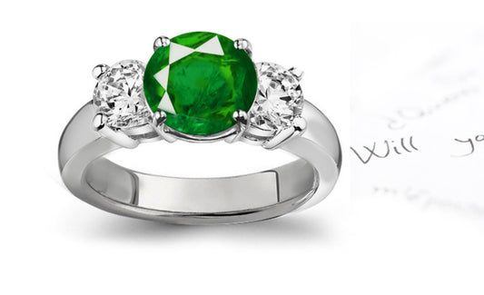 engagement ring three stone with round emerald and diamonds