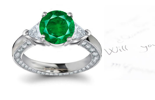 engagement ring with round emerald center and diamond accents band