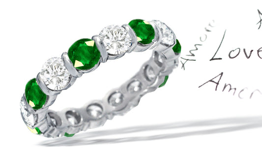 eternity ring bar set with round emeralds and diamonds