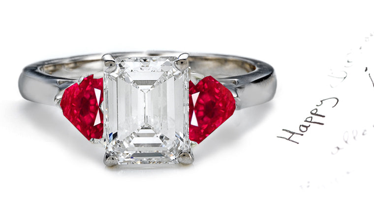 engagement ring three stone with emerald cut diamond and trillion ruby sides