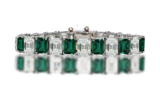 1 custom unique alternating emerald cut emerald and diamond tennis bracelet