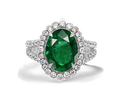 10 custom made emerald and diamond vintage halo engagement rings