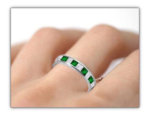 stackable eternity ring with alternating square emeralds and diamonds