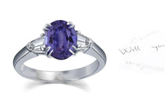 106 custom made unique oval cut purple sapphire center stone and bullet diamond side three stone engagement ring