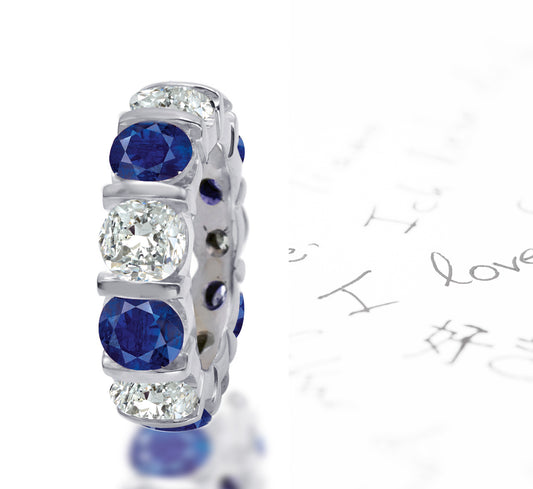 108 custom made unique stackable alternating round cut blue sapphire and diamond bar set eternity ring