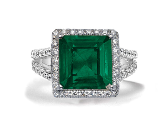 11 custom made emerald and diamond vintage halo engagement rings