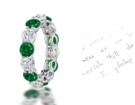 112 custom made unique stackable alternating round cut emerald diamond prong set eternity ring