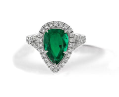 12 custom made emerald and diamond vintage halo engagement rings