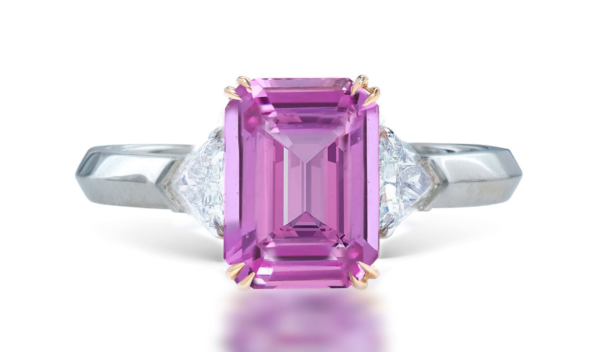 12 custom made unique emerald cut pink sapphire center stone with trillion diamond accents three stone engagement ring