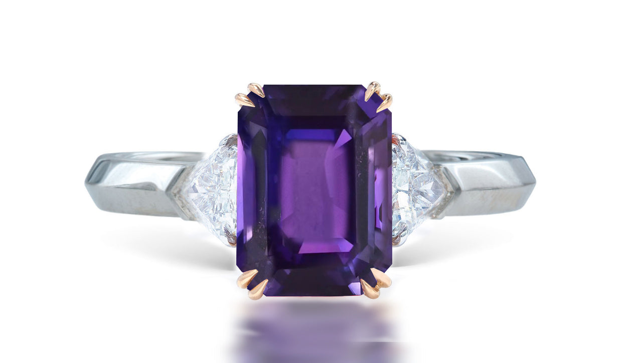 12 custom made unique emerald cut purple sapphire center stone with trillion diamond accents three stone engagement ring