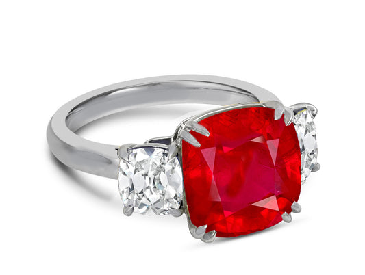 120 custom made unique cushion cut ruby center stone and cushion cut diamond side three stone engagement ring