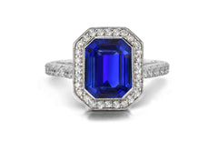 1202 custom made vintage inspired blue sapphire and diamond floral halo engagement rings