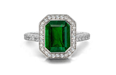 1202 custom made vintage inspired emerald and diamond floral halo engagement rings