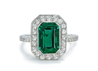 1208 custom made vintage inspired emerald and diamond floral halo engagement rings