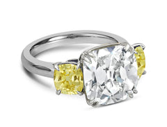 121 custom made unique cushion cut diamond center stone and cushion cut yellow sapphire side three stone engagement ring