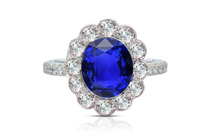 1215 custom made vintage inspired blue sapphire and diamond floral halo engagement rings