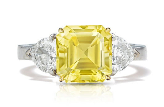 125 custom made unique asscher cut yellow sapphire center stone and heart diamond side three stone engagement ring