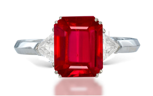 13 custom made unique emerald cut ruby center stone with trillion diamond accents three stone engagement ring