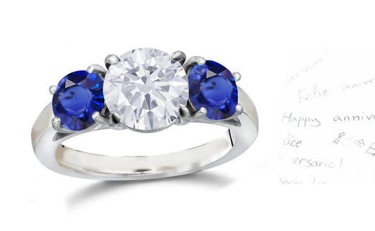 136 custom made unique round diamond center stone and round blue sapphire side three stone engagement ring