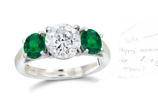 136 custom made unique round diamond center stone and round emerald side three stone engagement ring