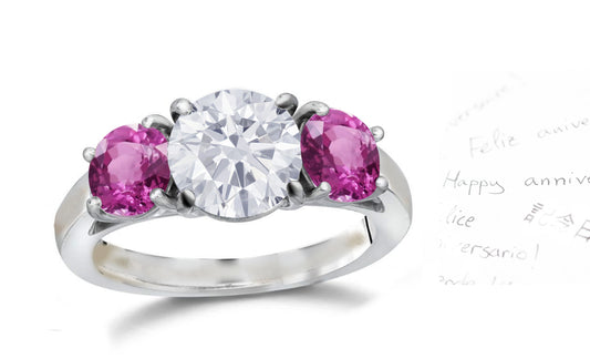 136 custom made unique round diamond center stone and round pink sapphire side three stone engagement ring