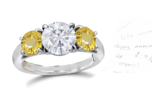 136 custom made unique round diamond center stone and round yellow sapphire side three stone engagement ring