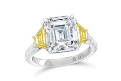 139 custom made unique emerald cut diamond center stone and trapezoid yellow sapphire side three stone engagement ring