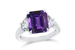 139 custom made unique emerald cut purple sapphire center stone and trapezoid diamond side three stone engagement ring