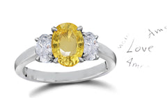 140 custom made unique oval yellow sapphire center stone and oval diamond side three stone engagement ring