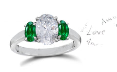 141 custom made unique oval diamond center stone and oval emerald side three stone engagement ring