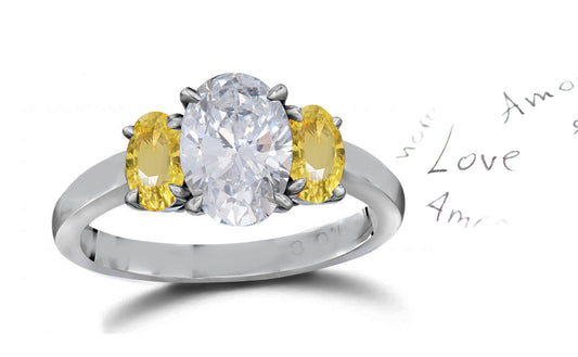 141 custom made unique oval diamond center stone and oval yellow sapphire side three stone engagement ring