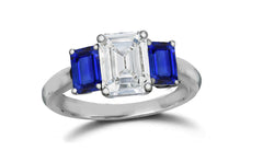 142 custom made unique emerald cut diamond center stone and emerald cut blue sapphire side three stone engagement ring