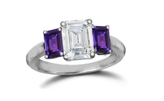 142 custom made unique emerald cut diamond center stone and emerald cut purple sapphire side three stone engagement ring